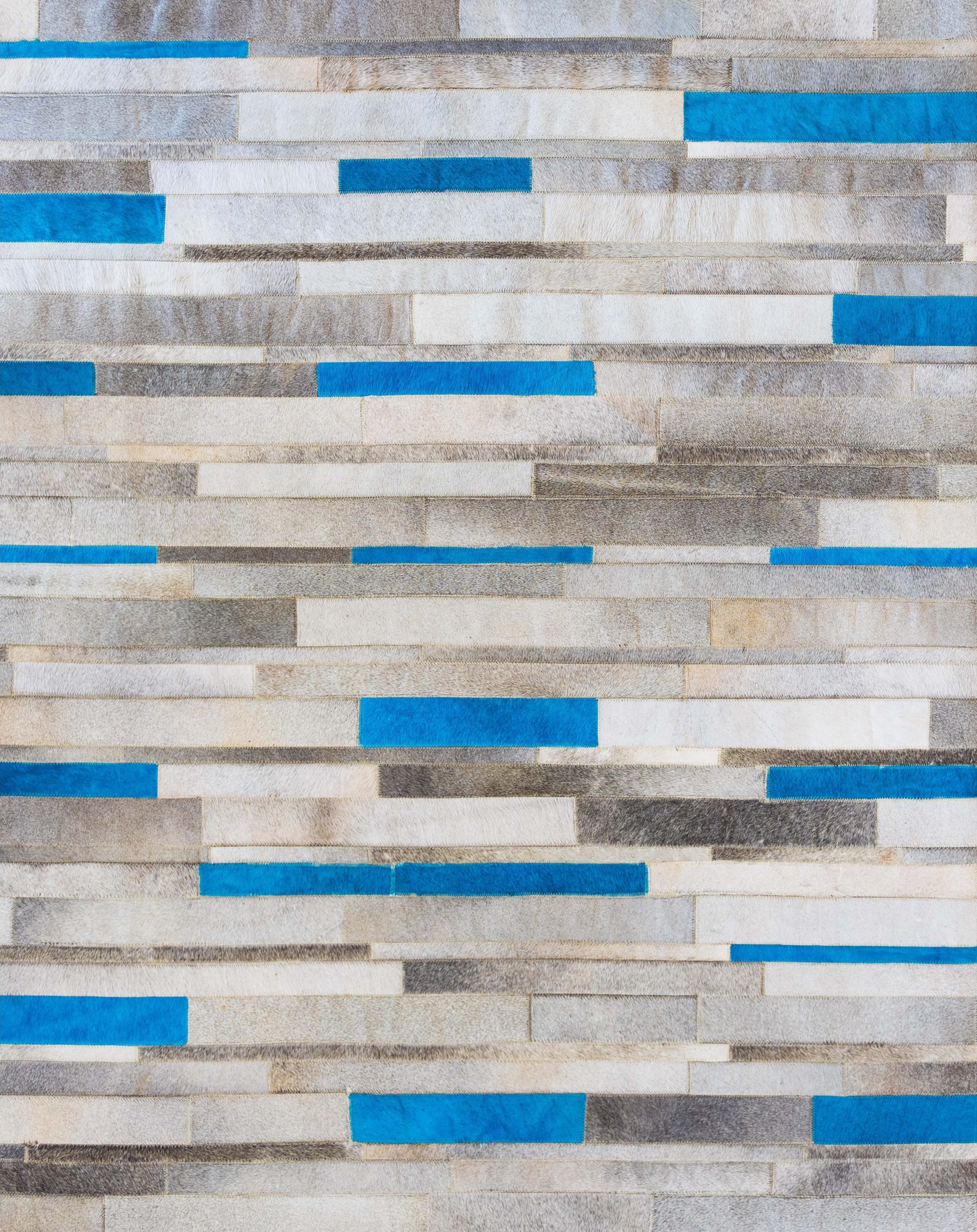 Vibrant Blue Grey Stripe Hide Rug - stunning low pile rug by The Cinnamon Room